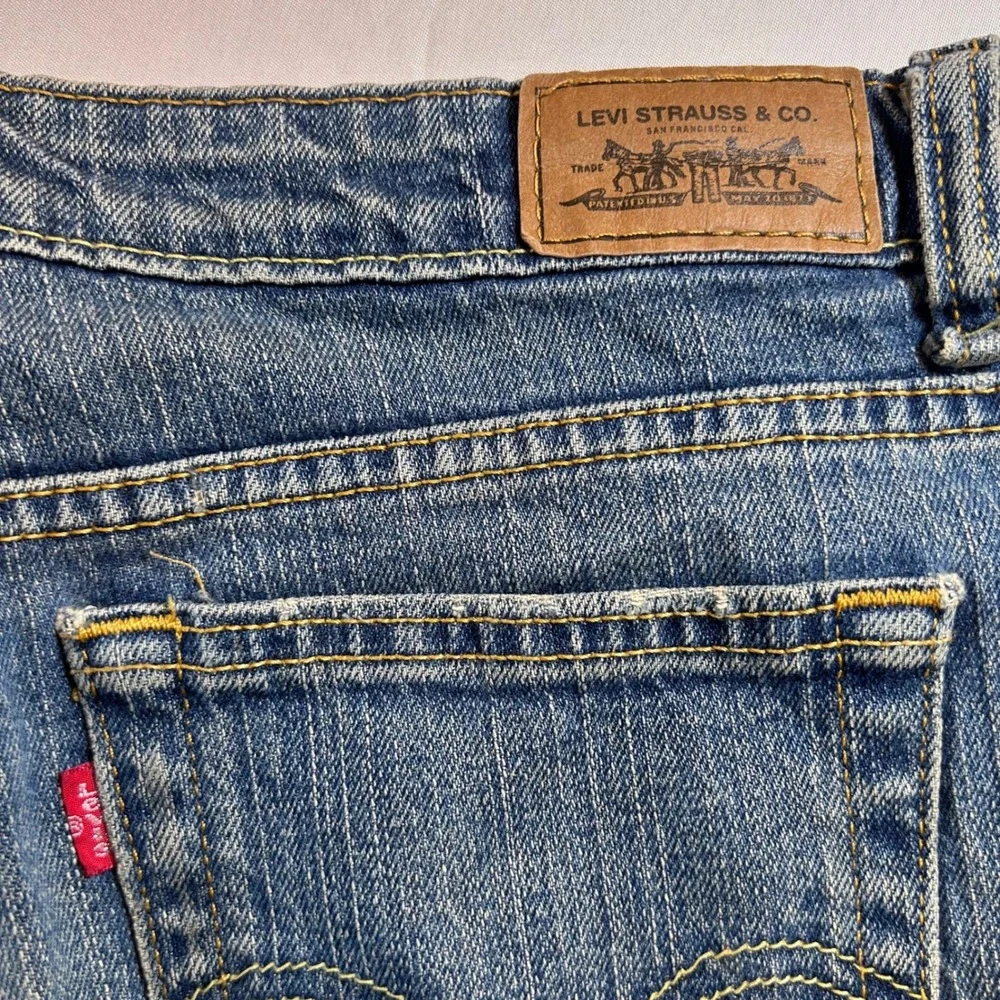 Levis 515 Boot Cut Jeans Mens 36x31 Blue Medium Wash Distressed Hem Denim